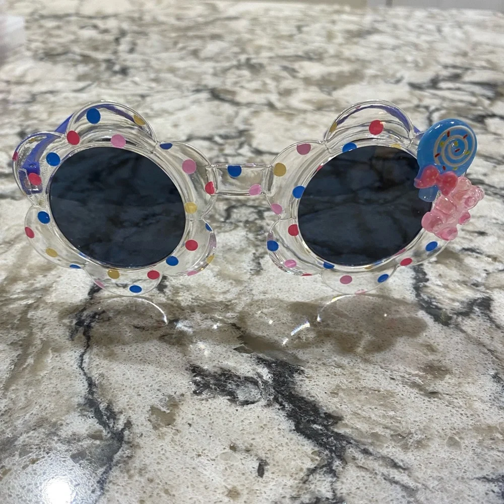 Girls flower shaped blue multi colored dot sunglasses